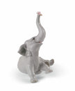 Lladro Baby Elephant with Pink Flower Figurine